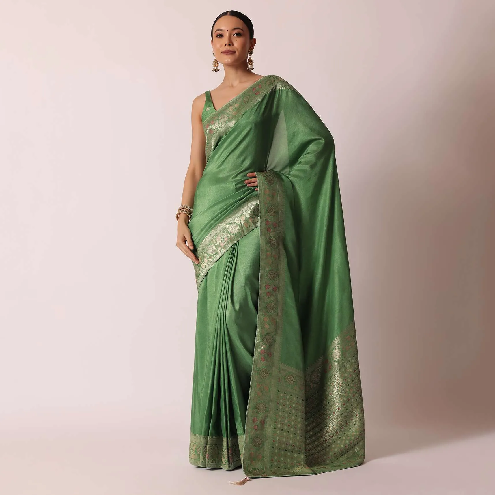 Green Banarasi Saree With Floral Motif Woven Pallu And Unstitched Blouse Piece