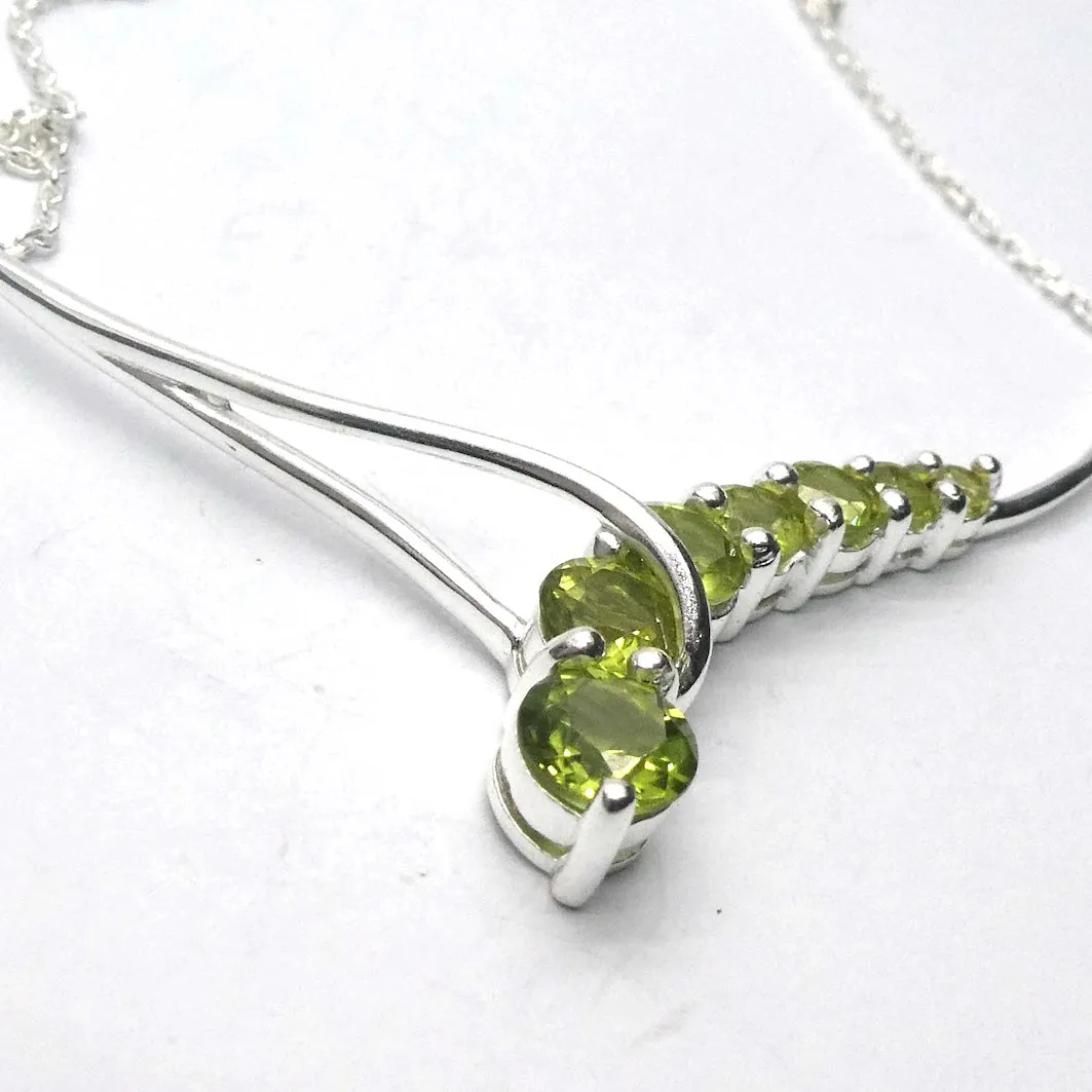 Peridot Necklace, 7 faceted Rounds, Comet, 925 Sterling Silver