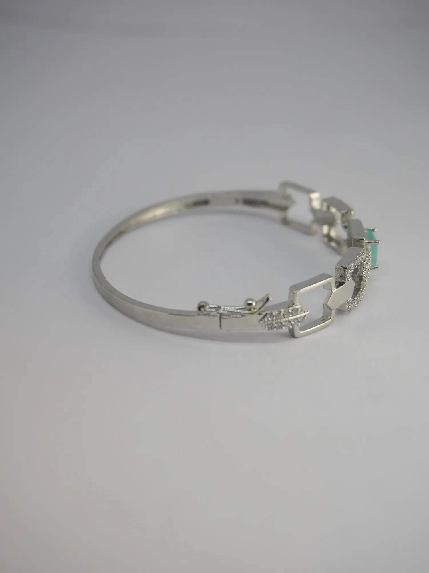 Rhodium-Plated Green Stone Bracelet with American Diamond