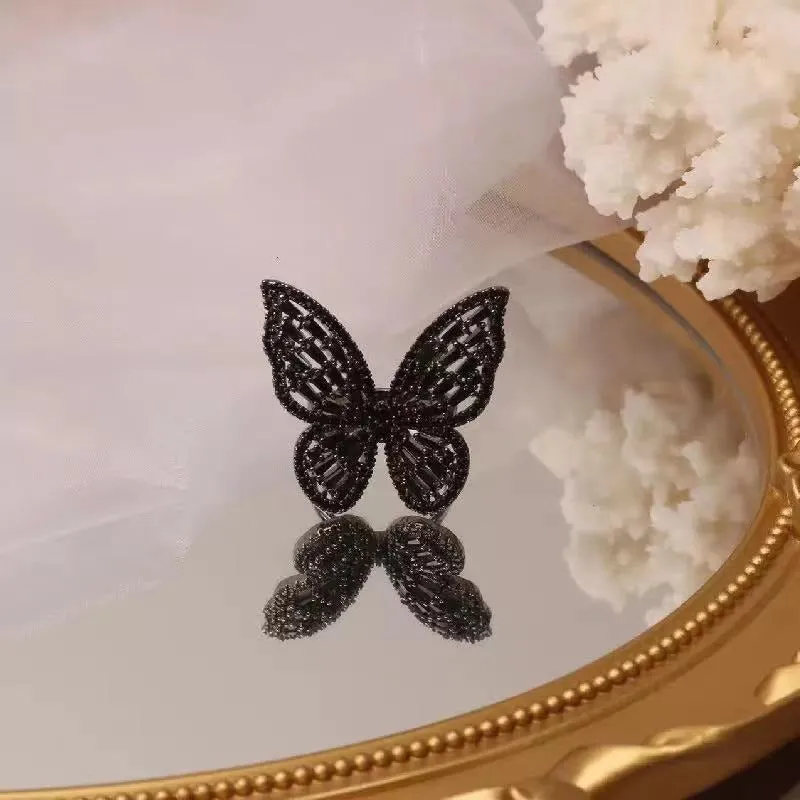 Whimsical Zircon Adorned Black Butterfly Rings